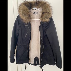 Winter coat with faux fur lining on hood